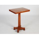 A 19th century satinwood occasional table, the rectangular top raised on a tapered octagonal