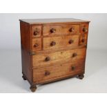 A 19th century mahogany and brass bound two-part campaign chest, the upper section fitted with two