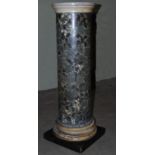 A late 19th century Scagliola column, the circular white marble top on a mottled green, black and