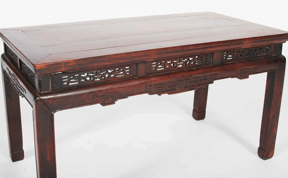 A Chinese dark wood Kang table, Qing Dynasty, the rectangular panelled top above a frieze set with - Image 4 of 5