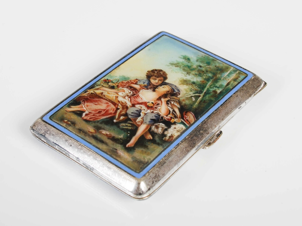 A late 19th/ early 20th century electroplate and guilloche enamel cigarette case, the hinged cover