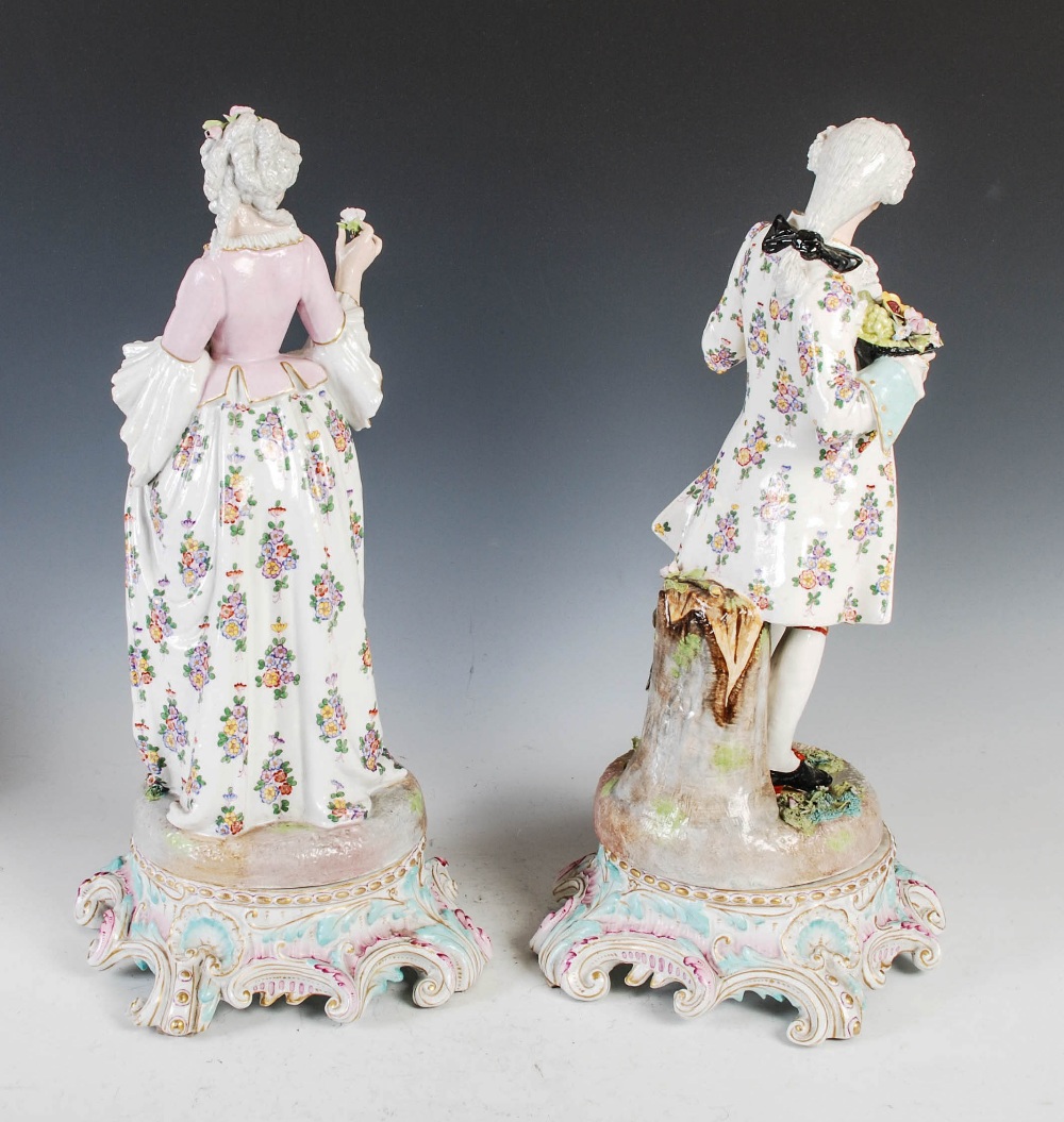 A pair of late 19th century Dresden porcelain figures, the male modelled standing holding a rose - Image 2 of 6