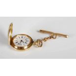 A Lady's 18ct gold half hunter fob watch, the outer case with blue enamel Roman numeral detail,