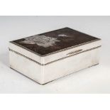 A Japanese silver rectangular shaped box, late 19th/ early 20th century, the hinged cover with