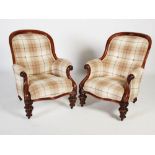 A pair of 19th century mahogany armchairs, the button down upholstered back, arms and serpentine