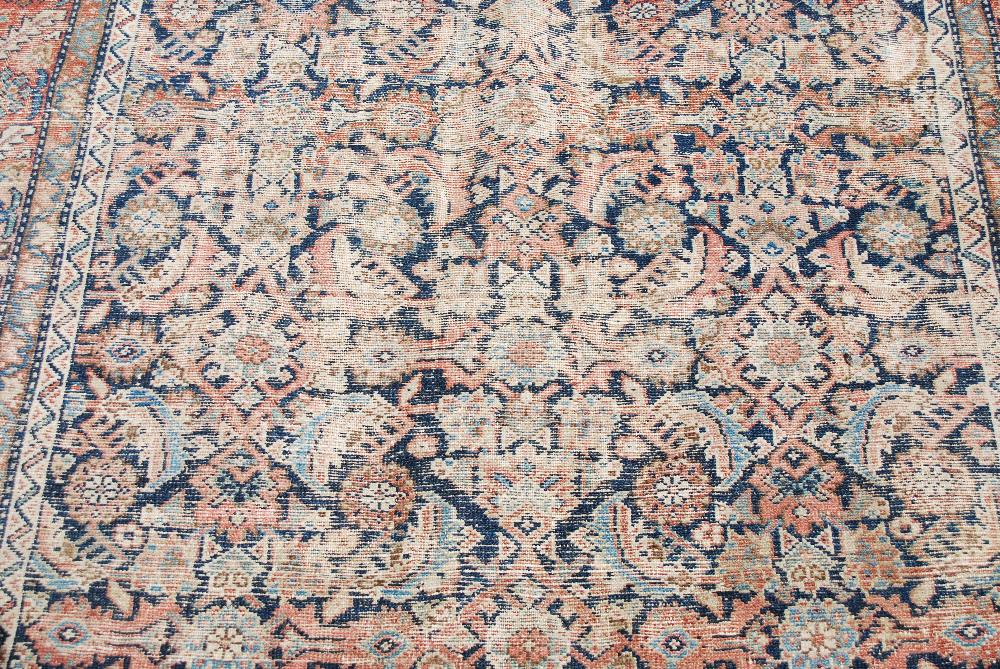 A Persian long rug and a Persian runner, the long rug with a blue rectangular field of stylised - Image 9 of 10