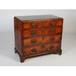 An 18th century walnut chest, the rectangular top with chevron banded border within a moulded