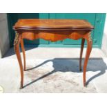 A late 19th century rosewood, marquetry and gilt metal mounted card table