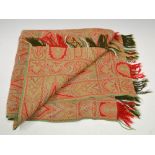 A rare late 19th century double sided Paisley shawl, worked in red, green, white and ochre