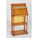 A late 19th/ early 20th century satinwood and gilt metal mounted writing bureau of neat proportions,