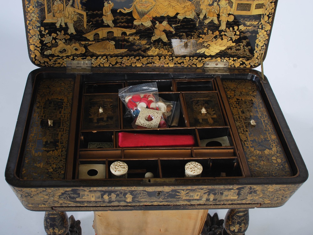 A 19th century Chinese export lacquer work table, the hinged rectangular top decorated with - Image 7 of 9