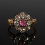 A Victorian yellow and white metal ruby and diamond cluster ring, centred with a rectangular cushion