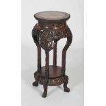 Chinese darkwood jardiniere stand, Qing Dynasty, the circular top with mottled pink and white marble