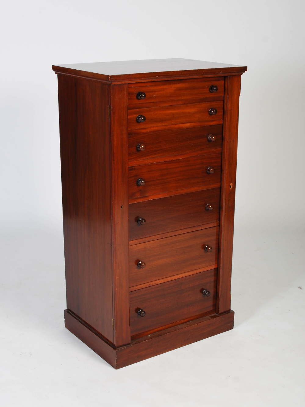 A 19th century mahogany Wellington chest, the rectangular top above seven long graduated drawers