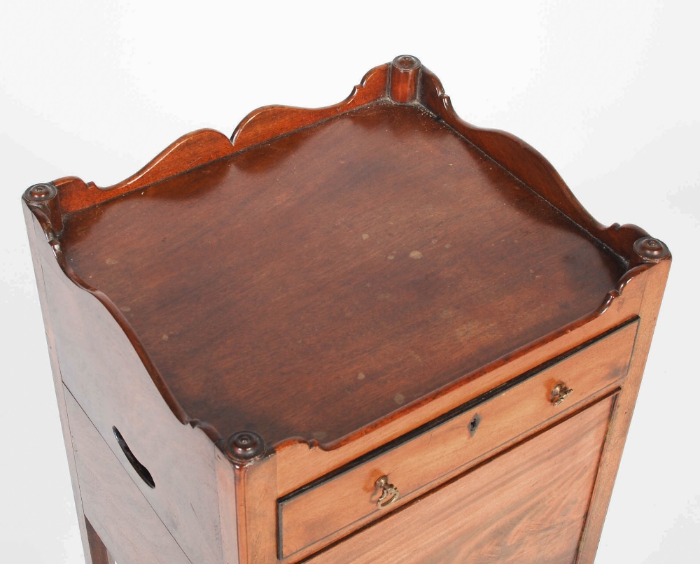 A 19th century mahogany bedside locker in George III style, the rectangular top with shaped three - Image 2 of 5