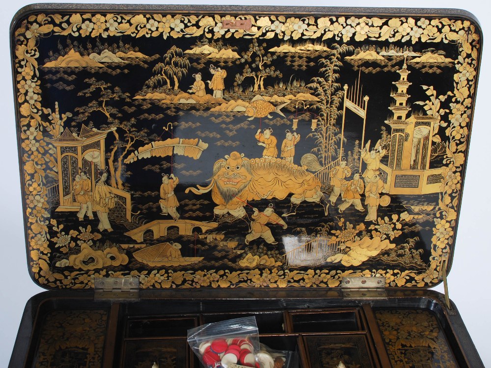 A 19th century Chinese export lacquer work table, the hinged rectangular top decorated with - Image 8 of 9