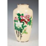 A Japanese ivory coloured ground silver wire work cloisonne vase, Taisho Period, decorated with