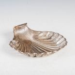 A Victorian silver shell shaped dish, Sheffield, 1899, makers mark 'RM' over 'EH', 21cm wide, 6.8