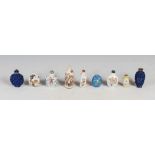 A collection of nine Chinese porcelain snuff bottles, Qing Dynasty and later, to include; a square