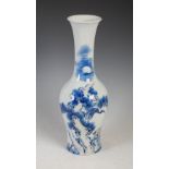 A Chinese porcelain blue, white and copper red bottle vase, bearing six character Kangxi mark,