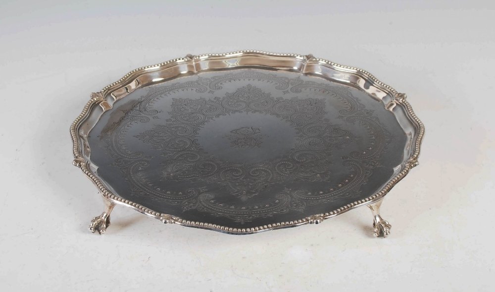 A Victorian silver salver, London, 1875, makers mark of JB over EB, of shaped circular form with