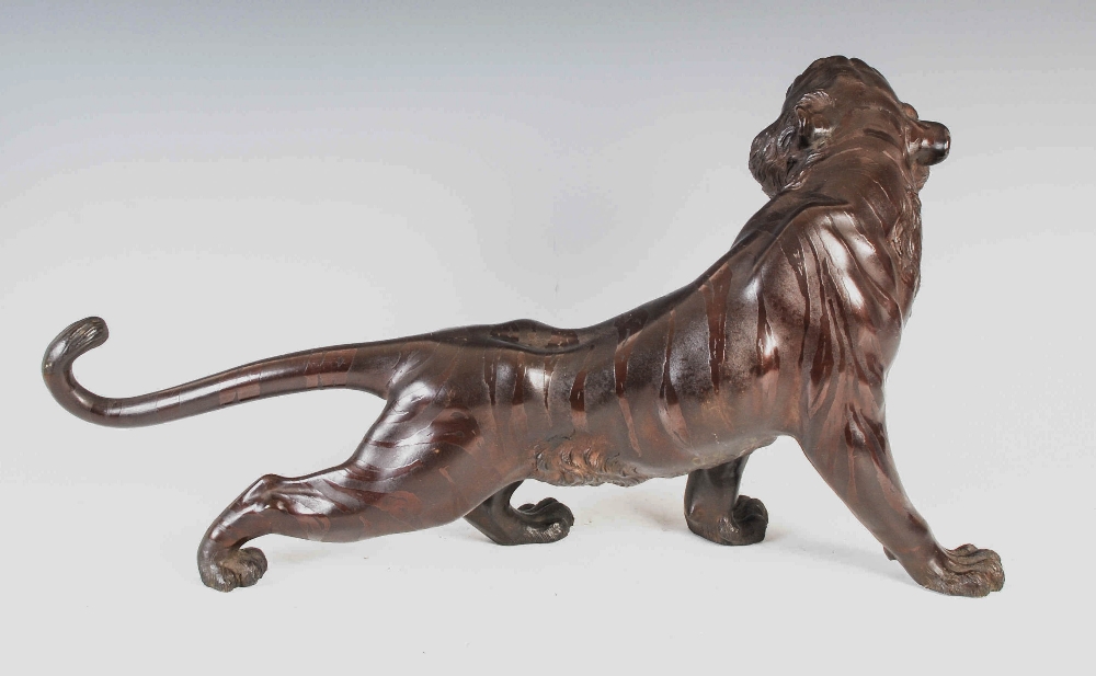 A Japanese bronze tiger, Meiji Period, signed, 55cm wide x 28.5cm high. - Image 2 of 5