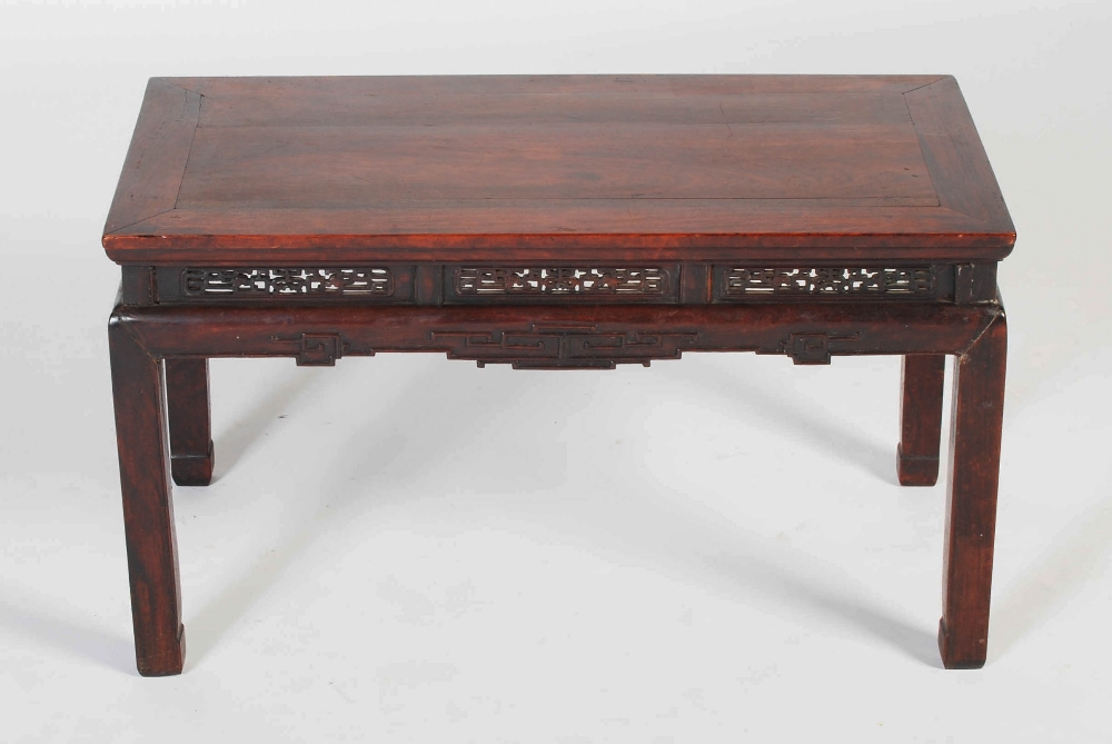 A Chinese dark wood Kang table, Qing Dynasty, the rectangular panelled top above a frieze set with - Image 5 of 5