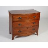 A George III mahogany bowfront chest, the shaped top with moulded edge above three long graduated