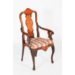 A late 18th/ early 19th century Dutch mahogany and marquetry inlaid armchair, the vase-shaped