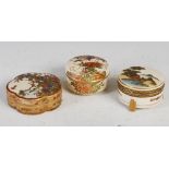 A group of three Japanese Satsuma pottery boxes and covers, Meiji Period, to include a shaped