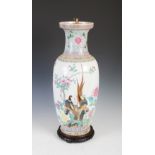 A Chinese porcelain famille rose vase later converted to a table lamp, early 20th century, decorated