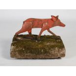 A late 19th/ early 20th century cast metal and stone boot scrape in the form of a fox, the fox