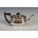 A George V silver teapot, Sheffield, 1931, makers mark of EV, oval shaped, 23.2 troy ozs.