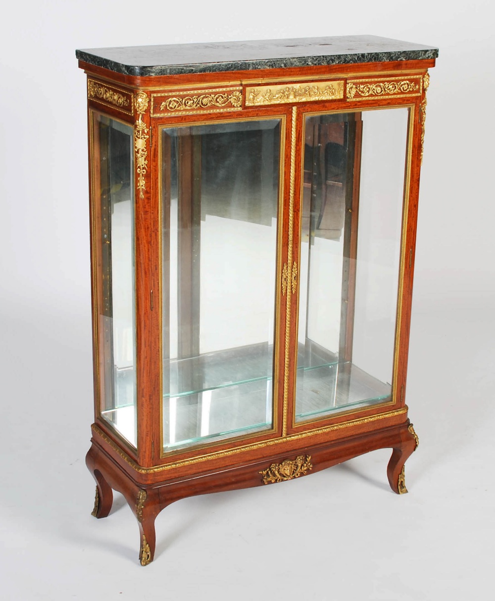 A late 19th century French satinwood and gilt metal mounted side cabinet, the mottled black, white
