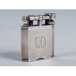 A George VI silver lighter by Dunhill, London, 1937, makers mark of AD, PAT No. 390107, with