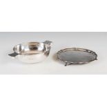 An Art Deco silver salver and silver quaich, the salver marked Sheffield, 1929, maker HELd, of