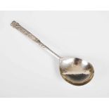 An 18th century silver spoon, probably Norwegian, with fig shaped bowl, the stem with flat scroll