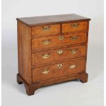 A 18th century walnut bachelor's chest of neat proportions, the rectangular top with moulded edge
