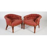 A pair of late 19th century horseshoe back conversation chairs, the button down upholstered backs