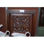 LATE 19TH/ EARLY 20TH CENTURY CARVED OAK SQUARE-SHAPED PANEL WITH LEAF AND FRUIT DETAIL.