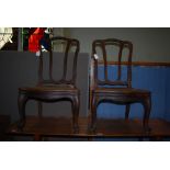 PAIR OF LATE 19TH CENTURY ANGLO-INDIAN COLONIAL LOW SIDE CHAIRS WITH BRASS STUDDED LEATHER SEATS