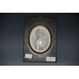A DECORATIVE PORTRAIT MINIATURE CONTAINING PRINT OF AN 18TH CENTURY LADY.