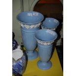 WEDGWOOD BLUE GROUND TAPERED CYLINDRICAL VASE WITH WHITE FLORAL DETAIL TO GO WITH ANOTHER PAIR OF