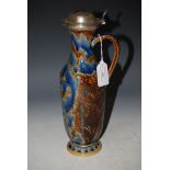 A DOULTON LAMBETH STONEWARE SILVER MOUNTED EWER, DATED 1874 WITH INCISED DECORATION BEARING INITIALS