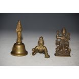 THREE PIECES OF LATE 19TH / EARLY 20TH CENTURY INDIAN BRASSWARE TO INCLUDE BELL AND TWO FIGURES