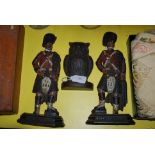 GREENLEES OF GLASGOW, A PAIR OF COLD PAINTED CAST IRON FIGURAL DOORSTOPS IN THE FORM OF HIGHLAND