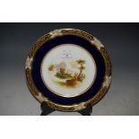 MINTON HAND PAINTED COBALT BLUE GROUND CABINET PLATE, WITH NAMED VIEW 'LOCH AN EILEIN'.