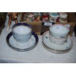 A PAIR OF 19TH CENTURY ENGLISH BLUE, WHITE AND GILT PORCELAIN TEA BOWLS AND SAUCERS, TOGETHER WITH