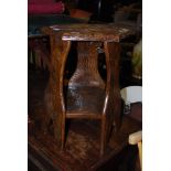 AN EARLY 20TH CENTURY HEXAGONAL SHAPED OCCASIONAL TABLE WITH ALL OVER CARVED FOLIATE DETAIL