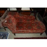 A VICTORIAN MAHOGANY CARPET UPHOLSTERED CHAISE LONGUE OF NEAT PROPORTIONS